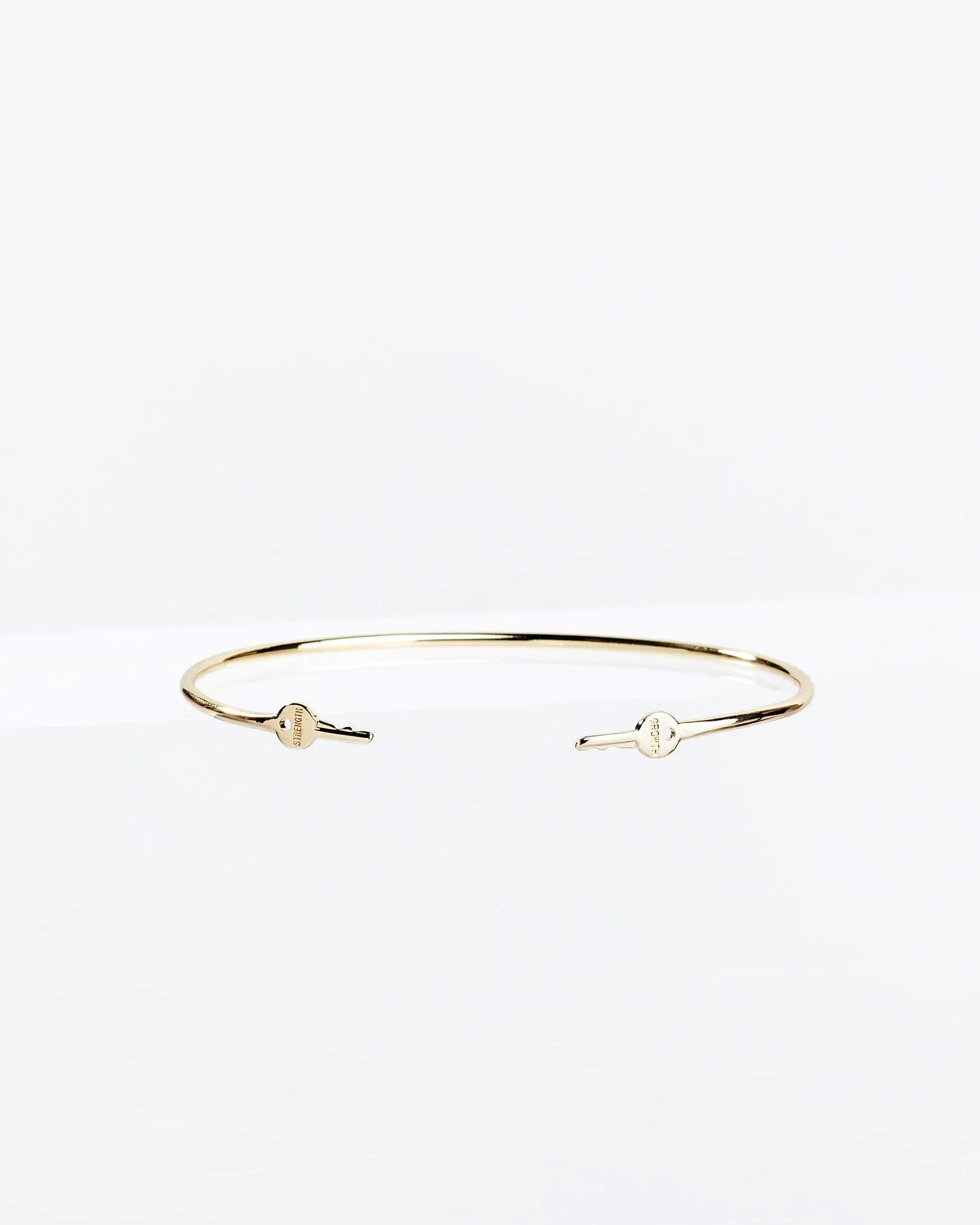 Gold Wrapped Mini Key Bangle