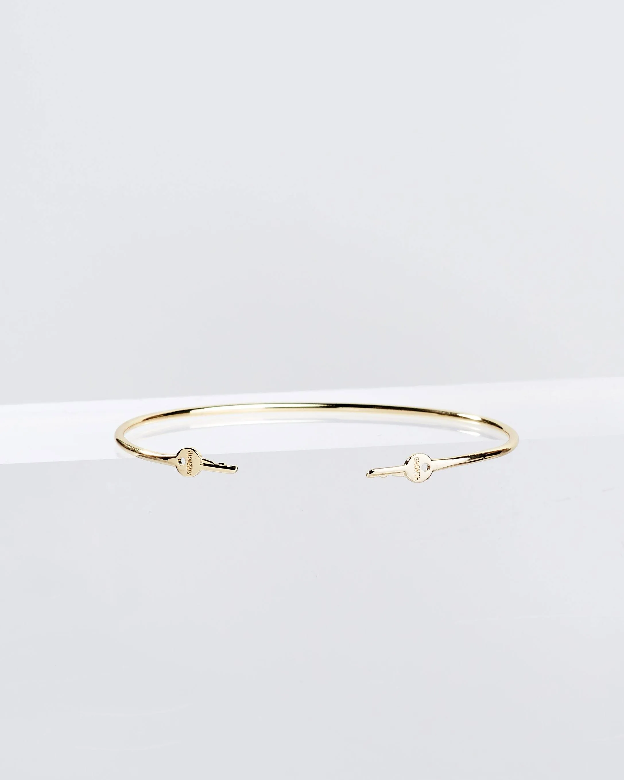 Gold Wrapped Mini Key Bangle